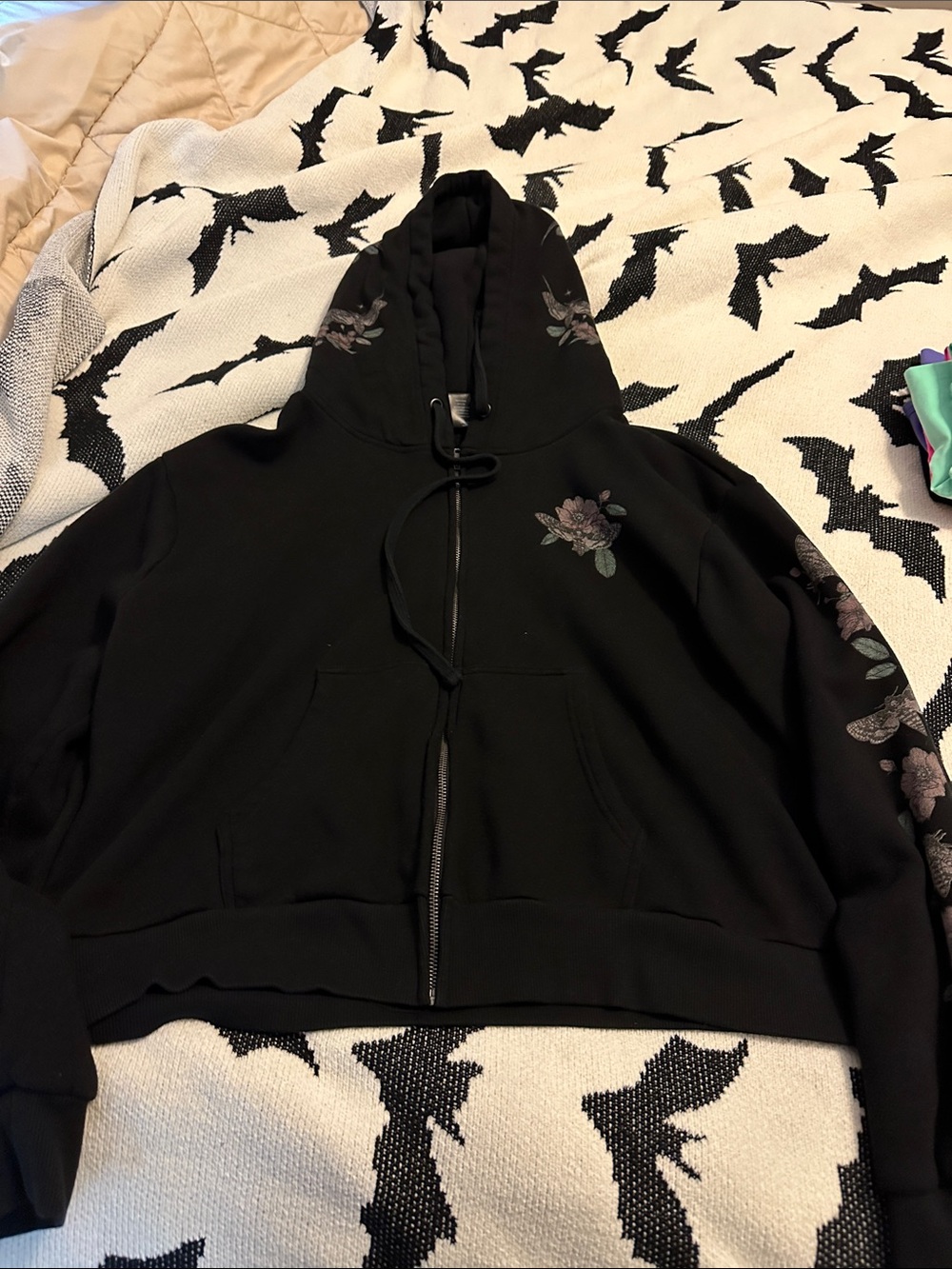 Black Zip-Up Hoodie with Subtle Floral